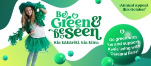 Cerebral Palsy fundraising banner. Girl dressed in a green shirt white teeshirt with a green cowboy style hat and green boa scarf