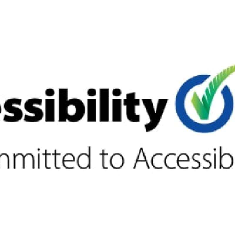 Accessibility Tick. Committed to Accessibility. Logo.