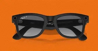 A pair of Ray-Ban Meta glasses sitting folded on an orange background, showing small cameras on each side of the outside lenses.  