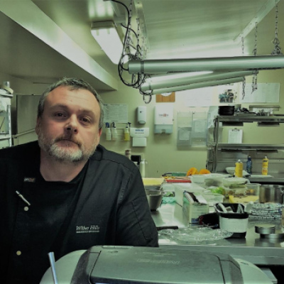 Ross in his happy place - a commercial kitchen