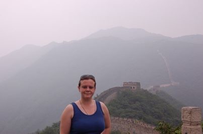 Chandra on the Great Wall of China, surrounded by mist.